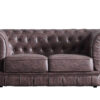 Sofá diseño clásico Chesterfield 2 plazas. Acabado capitoné con botones tapizados. Tejido imitación cuero envejecido. Medidas: 162 x 82 x 72 cm.
